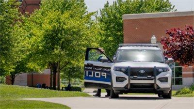 A GV police officer waiting to facilitate traffic for incoming runners/walkers.